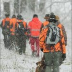 Group of hunters wearing blaze orange hunting clothing Hunting Day Slovak University of Agriculture