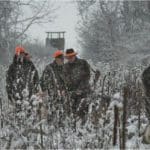 Group of Hunters Hunting in Blaze Orange Camo Hunting Clothing
